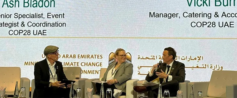 People talking at a climate conference